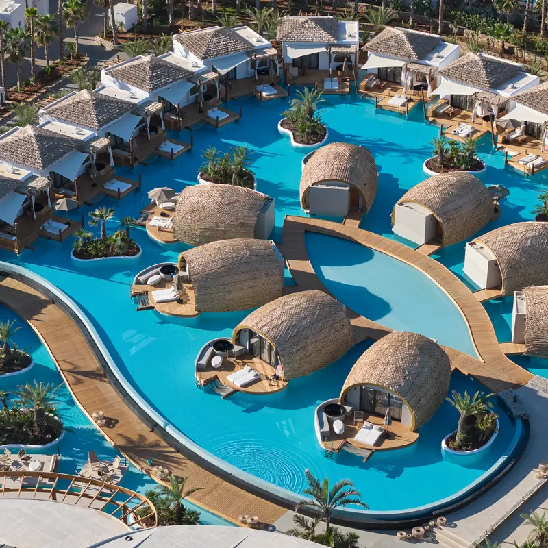 Stella Hotels Collection on Crete: villas around a lagoon pool, seen from above